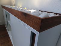 11treedesigns - Sideboard mit Steinen